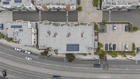 Photo of 9908 Artesia Boulevard #102, Bellflower, CA 90706 (MLS # PW25143037)