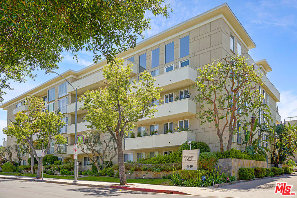 Enter down a long private drive to the opulent entrance of the Valley's most luxurious full-service doorman building. A grand three-story lobby welcomes you home to a lifestyle of comfort, convenience, and sophistication. This expansive 2-bedroom, 2-bath condo is the largest 2-bedroom floor plan in the building, filled with abundant natural light and thoughtfully designed living spaces. The oversized living and dining area flows seamlessly from a spacious eat-in kitchen ideal for everyday living and effortless entertaining. A highly desirable split-bedroom layout offers maximum privacy, with the primary suite featuring two large closets and a spa-inspired bath with double vanities, a soaking tub, and a separate shower. Step out onto your private balcony overlooking the tranquil, resort-style pool and spa.Enjoy world-class amenities including a gym, sauna, and reservable recreation room, plus 24-hour concierge and security for true full-service living. The unit also includes in-unit laundry and two tandem parking spots in a secure gated garage. Located directly across from picturesque Genesta Parkhome to tennis and pickleball courtsthis residence offers the perfect blend of peaceful escape and vibrant community living. HOA dues include water, trash, earthquake insurance, cable, and internet. A rare opportunity to live in one of Encino's most coveted luxury communities.