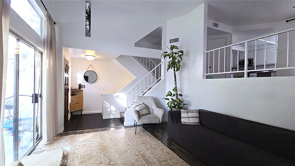 This desirable tri-level townhome is located in San Fernando. The property features two bedrooms: a spacious main bedroom with a walk-in closet and a good-sized second bedroom. Upstairs, there is a full bathroom shared by both bedrooms, along with a small balcony in the main bedroom that overlooks the beautiful green area surrounding the complex garden and pool, providing a tranquil atmosphere.
Downstairs, the living room is filled with natural light and includes a fireplace, while the dining area opens up to a small private patio with a BBQ area. The kitchen is also bright and offers plenty of cabinets and an additional closet that can be utilized as a pantry.
A guest bathroom, an attached two-car garage, and a large storage area exist.
The complex offers a community pool, spa, grassy lawn, and BBQ facilities. This property is a must-see, conveniently located near shopping areas, restaurants, and bus stops.