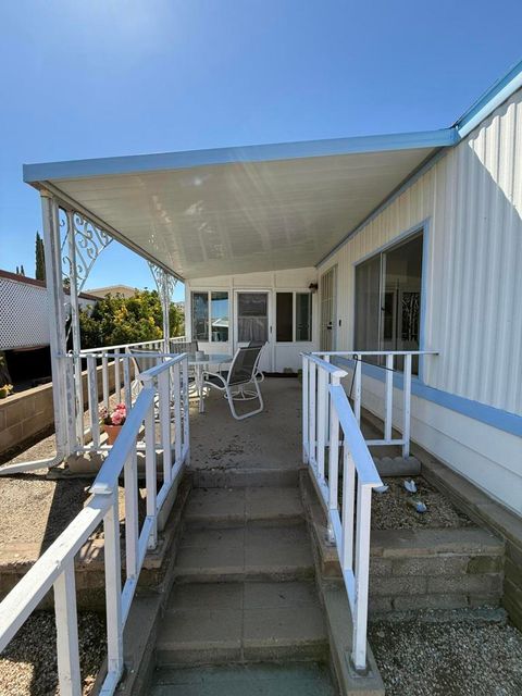 Photo of 7501 Palm Avenue Ave #162, Yucca Valley, CA 92284 (MLS # 219136084PS)