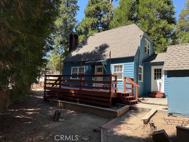 Charming Lake Arrowhead Home - Welcome to this adorable, remodeled cabin in Lake Rights of Arrowhead, walking distance to Jensons, Cedar Glen shops, across from the hottest coffee shop in town. Includes 2-bedrooms featuring 1 full bath on the main level, including a newly added 1/2 bath upstairs. Thoughtfully updated throughout, the home blends modern comfort with mountain charm.
The main level offers an open living room with a cozy fireplace, hardwood floors, and a dining area off the remodeled kitchen, complete with slate tile, a coffee bar, and included appliances (refrigerator, gas stove, washer, and dryer). A convenient laundry room was added for convenience just off the kitchen.
Upstairs, both bedrooms are light-filled, with one featuring the new half bath. Recent improvements include new windows, updated electrical and plumbing and replacement of the main line to the street, giving peace of mind for years to come.
The large, flat lot is fully fenced, perfect for kids and pets, and provides ample off-street parking plus a parking deck. The home can also be offered fully furnished, making it move-in ready.
Located in the Palisades of Lake Arrowhead, this property is ideal as a full-time residence, or vacation home.