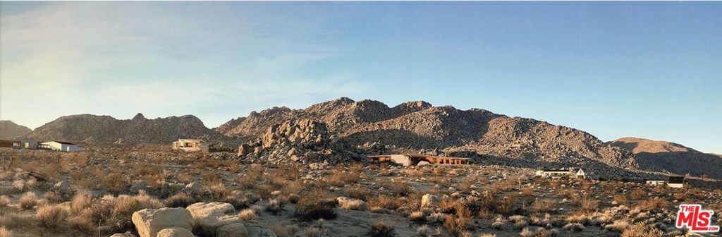 VALLEY VISTA Prime 2.5 acre parcel, perfectly placed amidst an array of naturally sculpted boulders, the majestic mountain skyline of Joshua Tree National Park, and breathtaking views of the Hidden River Valley Desert Reserve. Utilities, soils, percolation, engineering, architectural and other supporting documents available.