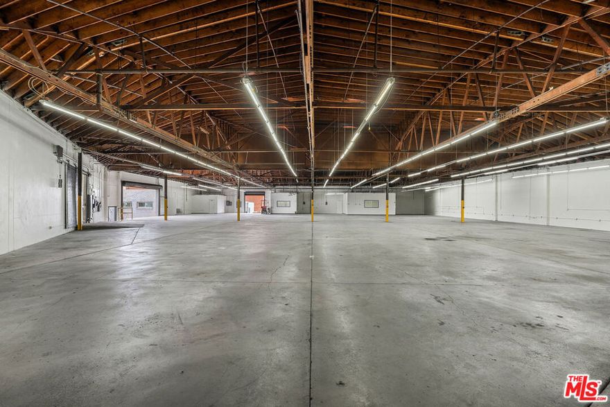 Discover the exceptional functionality and visibility of 3301 Maple Avenue. Prominent, free-standing industrial facility located within a gated and secured campus, just minutes from Downtown Los Angeles and the USC corridor. With immediate access to the I-10 and I-110 freeways, this property offers unparalleled connectivity for logistics, distribution, and creative industries alike. The building spans a generous footprint and features dual dock-high loading bays, ideal for high-volume operations. Inside, you'll find impressive bow-truss ceilings with clear heights ranging from 16 to 20 feet, enhancing spatial efficiency for warehousing, manufacturing, or studio-style creative use. Suite A includes approximately 2,809 square feet of dedicated office space, while Suite B offers 14,701 square feet of warehouse/flex space, providing a balanced environment for operational and administrative functions. Highlights include: - Gated and secure industrial campus with ample on-site parking. - Strategic location with high visibility and excellent freeway access - Versatile mix of warehouse, office, and production areas - Dock-high loading on two sides for optimal logistics - Flexible and accommodating ownership willing to work with a range of tenant needs - Immediate availability!