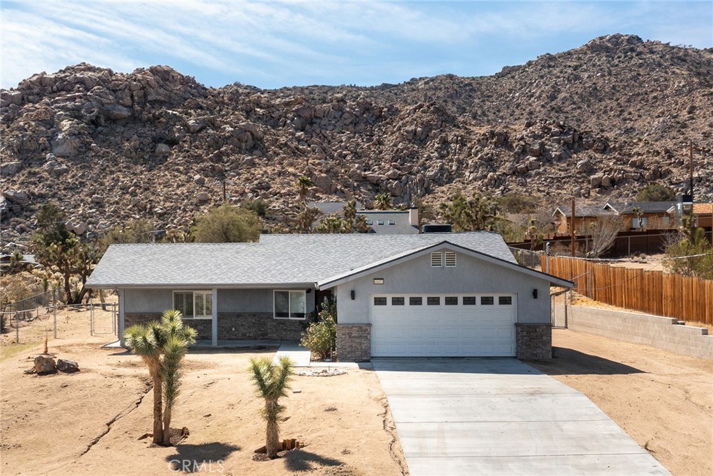 BEST PRICE for Newer Construction home in Joshua Tree near the National Park, walking distance to Boulders and Wilderness. Newer 2019 Build, whereas most local housing stock is older and built in the 1960s, ‘70s & ‘80s without the efficiency required by newer building codes. GREAT LOCATION High on Hill overlooking downtown out front and boulders mountains out back. FANTASTIC Investment Opportunity: Seller purchased for $640k in January 2022 and is now for selling for $390K due to poor market conditions, an amazing $250k reduction from previous purchase price – seller’s loss is buyer’s gain! RARE OPPORTUNITY for a house this high on the hill, this close to the National Park, this new and at this price as a standard conventional sell!