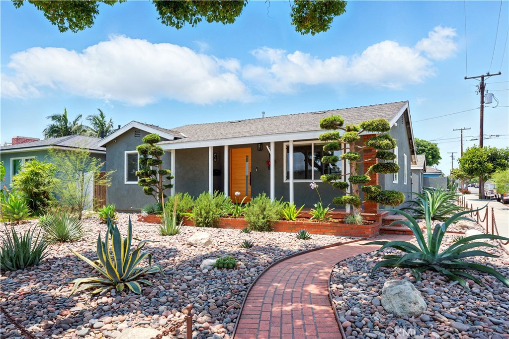Welcome to this beautifully renovated corner home, ideally located north of Whittier Blvd in the vibrant city of Montebello. Featuring 3 spacious bedrooms and 1.5 stylish bathrooms. This turnkey property offers comfort, style, and convenience all in one. Step inside to an inviting open-concept layout with recessed lighting and laminated wood floors throughout. The heart of the home is the stunning kitchen, complete with quartz countertops, a massive center island, and plenty of cabinetry for all your storage needs. Enjoy seamless indoor-outdoor living with a gated large, private backyard—perfect for entertaining or relaxing under the sun. The low-maintenance desert landscape design in both the front and backyards enhances curb appeal while saving on water. A detached garage adds extra functionality and potential. Situated close to shopping centers, popular restaurants, parks, and with easy freeway access, this home offers the best of Montebello living. Don’t miss your opportunity to own this move-in ready gem!