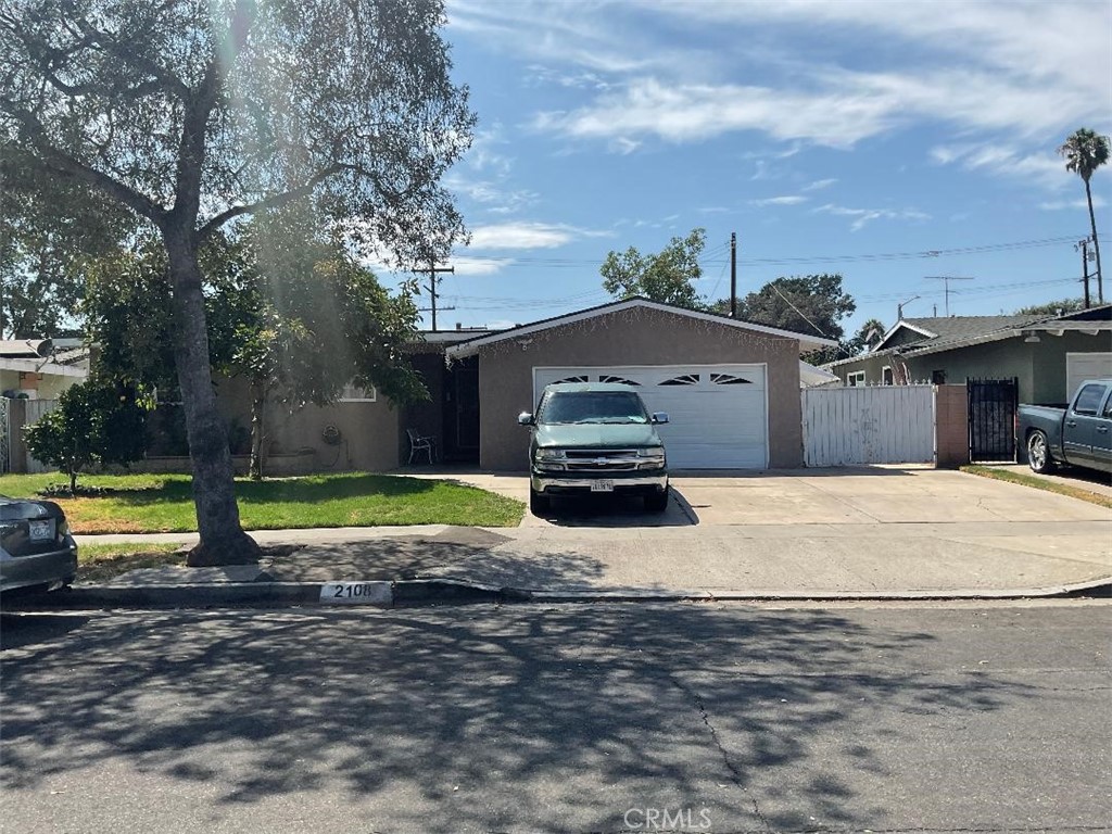 This is perfect home for the first time home buyers. 5 Bedrooms, 2 full bathrooms, 2 hallways, ceramic tile flooring, newer paint, windows, light and bright kitchen, fireplace dining room, Kitchen door leads directly to garage, washing and dryer machine in garage. Garage has a special storage room. This property comes with a long driveway that leads to the back of home. Fruits trees. All you need to do is come take a look and make an offer. See to believe! Home SQFT 1775. Nice, covered patio.