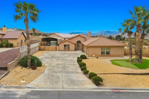 Photo of 8514 Barberry Avenue, Yucca Valley, CA 92284 (MLS # JT26121949)