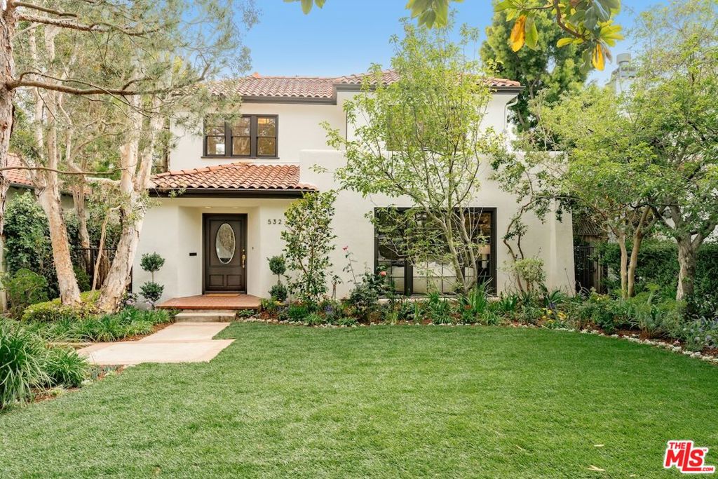 Located in the highly desirable North of Montana neighborhood of Santa Monica, this 4-bedroom, 3.5-bath Spanish-style home offers character and classic appeal. The inviting layout features light-filled living spaces, hardwood floors throughout and a warm, welcoming atmosphere. On the ground level, a spacious room with its own bathroom can serve as a den, home office, or additional bedroom if needed. Upstairs, you will find three generously sized bedrooms plus the primary suite with its own private balcony overlooking the backyard and pool. Outside, there's plenty of space for outdoor dining and lounging by the sparkling pool and spa, a small grassy yard perfect for relaxing or playing, and a detached two-car garage. Just moments from Montana Avenue's shops and restaurants, and within top-rated school district, this home combines location, charm, and the best of Santa Monica living. Long term lease only.