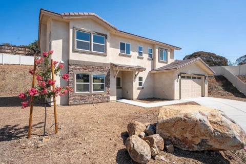Photo of 3880 Rojo Tierra Rd, La Mesa, CA 91941 (MLS # PTP2606800)