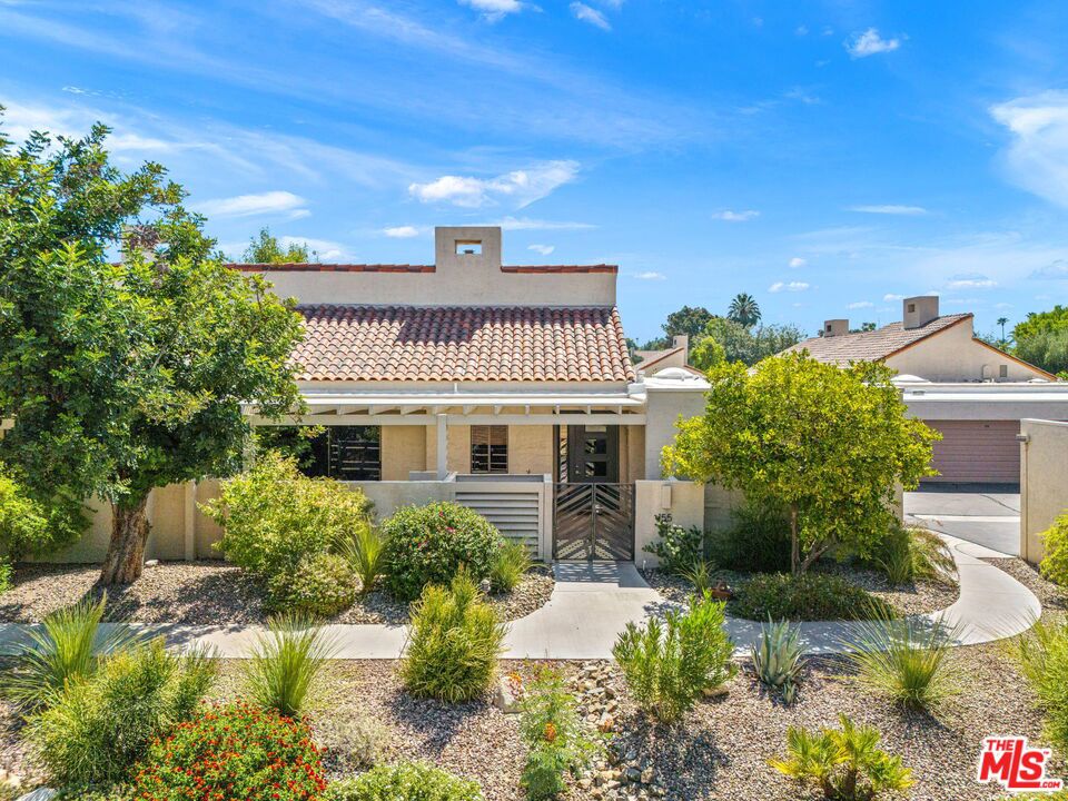 Experience the best of desert living in this beautifully remodeled 2BD/2BA golf course home, perfectly situated on the 3rd and 4th holes with sweeping views of the fairway and the majestic mountains. Nestled in the prestigious guard-gated Mission Hills Country Club, this elegant retreat offers a seamless blend of style, comfort, and sophistication. Step inside to soaring vaulted ceilings and walls of glass that flood the home with natural light and invite the outdoors in. The open-concept layout flows effortlessly from the spacious great room with a cozy gas fireplace to the stylish kitchen, highlighted by sleek finishes, a striking slated accent wall, and generous storage ideal for both everyday living and entertaining. The luxurious primary suite is a tranquil escape with serene views and spa-like ambiance. A private guest bedroom is thoughtfully tucked away, while a bar and an interior laundry room enhance the home's smart layout. Enjoy al fresco living year-round with both front and rear patios each with covered areas ideal for lounging or entertaining. From the front, take in breathtaking mountain vistas; from the back, soak in panoramic golf course and mountain views. Additional highlights include a 2+ car garage, proximity to a sparkling community pool and spa, and optional access to Mission Hills' world-class amenities three championship golf courses (Arnold Palmer, Pete Dye Challenge, and Dinah Shore Tournament), plus private tennis, fitness, and social memberships. Conveniently located near top Coachella Valley destinations including El Paseo, The River at Rancho Las Palmas, Indian Wells Tennis Garden, and Agua Caliente Casino. Live the dream in this refined desert oasis where luxury, lifestyle, and location come together.