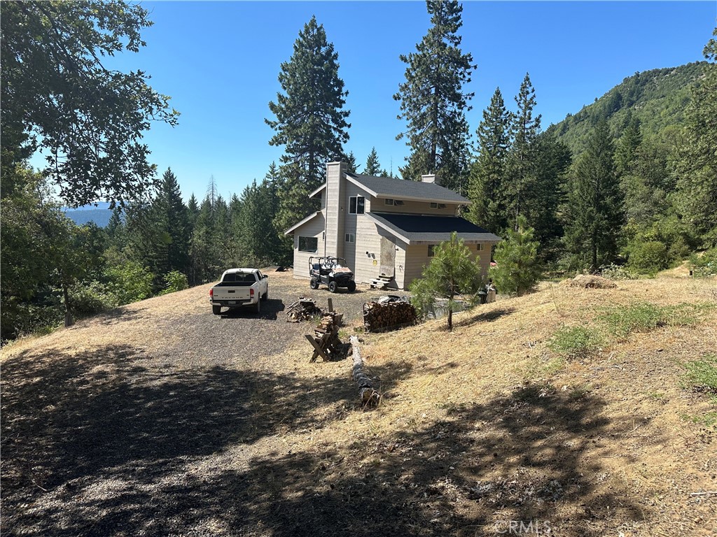 If you are looking for a property in the Mendocino National Forest that has a turn-key cabin and no growers mess to clean up, this is it. Has beautiful views of Lake Pillsbury and surrounding mountains, end of road privacy, and borders Govt land. Professionally developed spring and inline water tanks for domestic use and fire suppression. ATV/jeep trails are all over it, so you can access the far corners of the property which includes a small pond, oaks, timber, and the headwaters of Cedar Creek. Current owners have had game cameras scattered around the property, and these have shown an amazing diversity of wildlife. Very quiet, peaceful setting and not too far from Lake Pillsbury and the Eel River.