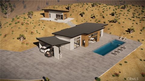 Photo of 5280 Hilton Avenue, Yucca Valley, CA 92284 (MLS # JT26028944)