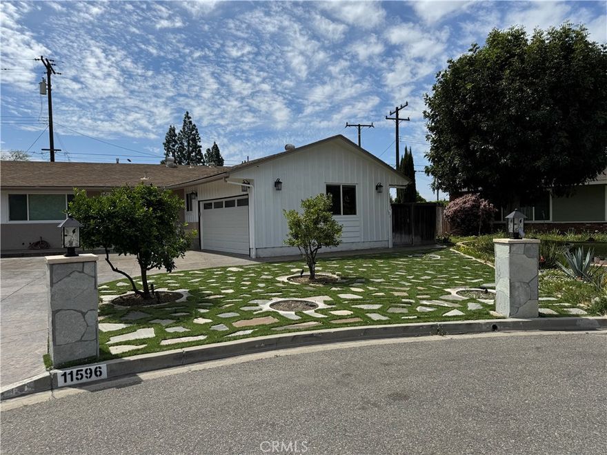 A stunning Dream House Awaits, Situated on a quiet Cul De Sac, completely remodeled house inside and out, Bright Open Design.  with the new Central AC and heat. Located in a peaceful quiet neighborhood, Gorgeous 3 bedrooms, 2 bathrooms and a spacious 2-car garage, The garage can be converted into a bedroom with central AC. close to schools, shopping and freeways, House Is Located in Great Location, this property offers a peaceful retreat, lots of attention to detail and high-quality finishes throughout. The master suite is a true retreat, boasting a luxurious bathroom with wainscotting, mosaic tile flooring, a vanity with double sinks, a shower with a frameless shower door, and a separate two closets.



Everything new in this house: new paint, recessed lighting, smooth ceilings, and tile flooring, high baseboards, ceiling fans, dual-pane windows, sliding doors, new interior doors, new exterior paint, which also offer generous closet space. The house offers a fully remodeled bathroom with a glass-door tiled shower, a sleek new vanity, and elegant tile flooring.



The private rear patio, enclosed by block wall fencing, offers ample space and leads Outside, you'll find a spacious backyard complete with grass and a brick patio. This outdoor oasis offers endless possibilities for spacious back yard perfect for outdoor entertainment and relaxation and enjoyment.  With its prime location and impeccable design, this house is truly one-of-a-kind.



The kitchen W/Walk-in pantry is a chef’s paradise, an absolute dream for any cooking enthusiast boasting a large island ideal for socializing, an open-concept design, brand-new cabinets with a pantry, gleaming quartz countertops, a stylish tile backsplash, stainless steel appliances, including a Samsung 4-Door flex with family Hub panel Stainless Steel built-, a 6-burner gas stove, a built-in microwave, and a dishwasher. The white and gray Shaker cabinetry provides ample storage space while the kitchen island adds both functionality and charm, The laundry is in the garage with a door to the kitchen and is conveniently located next to the kitchen. 



The family room is perfectly situated adjacent to the kitchen and features a cozy gas fireplace. This open-concept layout creates an inviting space for entertaining guests or spending quality time with loved ones. 



The house includes Tesla Universal Wall Connector - Electric Vehicle Charger with Dual Plug Type - Compatible for All North American EVs.