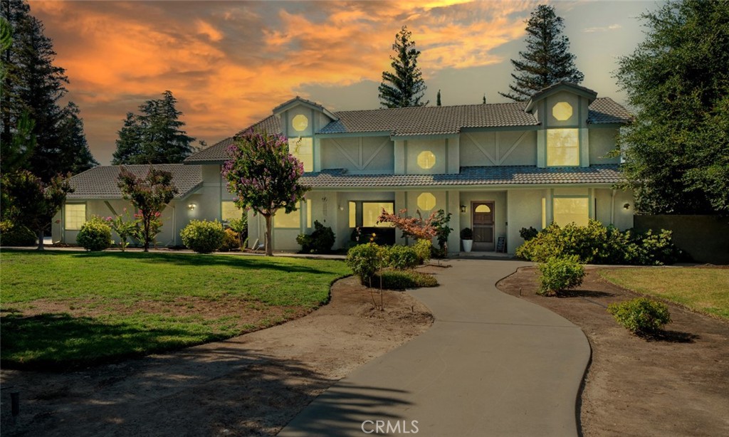 The exclusive Rolling Hills Estate is an oasis on just under 1 acre, offering a dream backyard perfect for entertaining. Enjoy country living near the city with owned solar and two separate homes. The main house, approximately 3,180 square feet, features two stories with two master suites. The granite island kitchen opens to the family room, and the floorplan includes a formal dining room, separate living and family rooms, and a spacious game room. All new appliances, new AC units, and a new pool pump add to the appeal. But that’s not all—a detached 2-bedroom, 2-bath home sits toward the back of the lot. This second home includes its own kitchen, living room, laundry area, and two-car garage. The property also boasts a custom pool, with the detached home measuring 1,200 square feet.