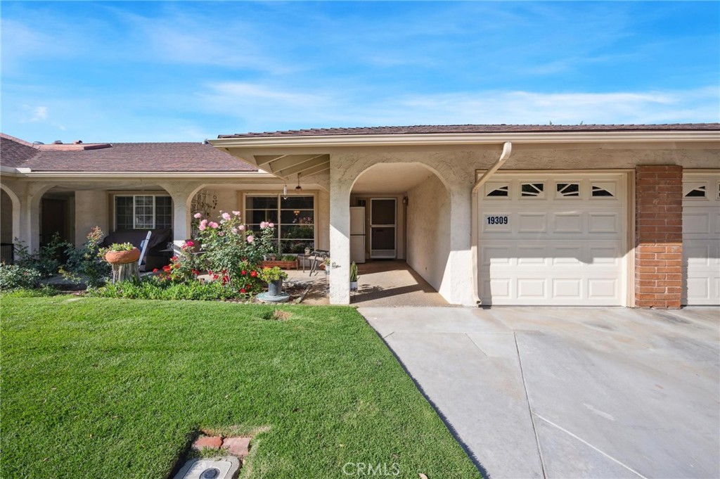 Located in one of the most sought-after spots in this 55+ Newhall community, Friendly Valley. This charming home sits across from a spacious grassy area, offering an open, expansive feel rarely found in the neighborhood. Inside, you’ll find a comfortable layout with a cozy living and dining area, an original kitchen with ample cabinetry, and a breakfast nook. A fully enclosed sunroom provides extra space for relaxing or entertaining. The primary suite includes generous closet space and an ensuite bathroom. Enjoy golf course views from the private back patio. The community features outstanding amenities, including a golf course, swimming pools, fitness classes, and social activities for residents. With a prime location close to shopping, dining, and freeway access, this is a rare opportunity you don’t want to miss!