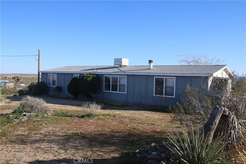 Photo of 1147 Cherokee Trl, Yucca Valley, CA 92284 (MLS # IV26037774)