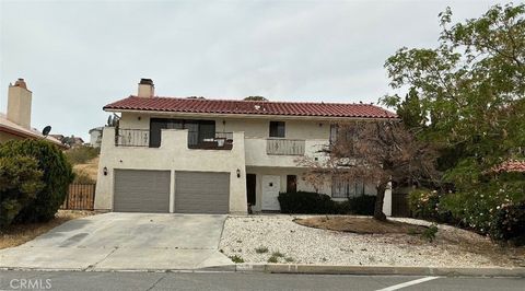 Photo of 13640 Spring Valley Pkwy, Victorville, CA 92395 (MLS # CV26080407)