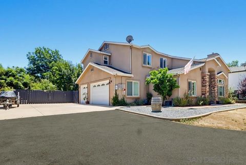 Photo of 9111 Tropico Dr, La Mesa, CA 91941 (MLS # 260014096SD)