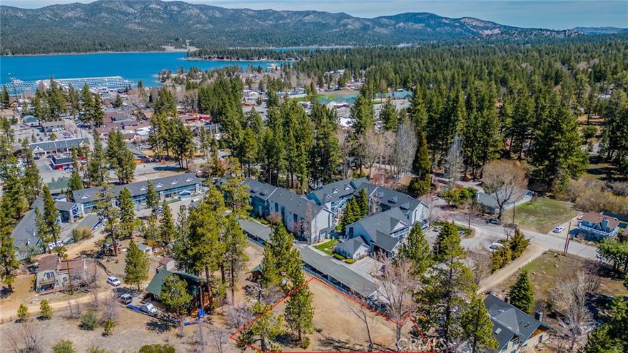 ****PRICE IMPROVEMENT!!! This exceptional property's PRIME location in Big Bear Lake offers a rare opportunity to build a dream home, mountain retreat or investment property! Situated off the main road, in a serene and private setting, this expansive residential lot spans nearly 1/2 acre at 21,000 sq ft, zoned R-3 for multifamily development, presenting a multitude of possibilities! You are walking distance to the village and Big Bear Lake with easy access to all utilities. Buyer to do own due diligence with respect to utilities, footage, and city requirements! Don't miss this opportunity to own a piece of paradise! An address has not been assigned. Photos 11 and 12 were AI generated to demonstrate remarkable potential.