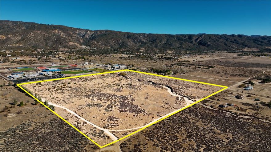 39.1 Acre Anza Lot directly across from the school. This lot is very flat and usable with mountain and valley views. Very unique location with such a large usable lot on paved road frontage. Currently zoned R-R-2 1/2.  Ask the County about the possibility to rezone into commercial. Could make a great horse ranch or housing subdivision too! Buyer to verify and confirm all intended uses current and future with County of Riverside and satisfy themselves before closing.  ****Bank financing available with as little as 15% down payment****