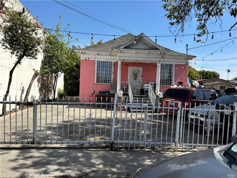 Photo of 115 E 36th St, Los Angeles, CA 90011 (MLS # DW26084312)