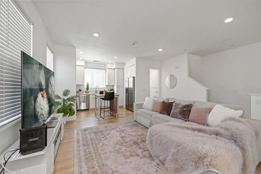 Welcome to this Incredible, Upgraded, Move-in Ready Corner Townhome with LOW HOA & NO MELLO-ROOS! This stunning 2-bedroom, 2.5-bath corner unit offers the perfect combination of modern comfort, functionality, and style. The open-concept layout features abundant natural light and a private balcony — ideal for relaxing or enjoying your morning coffee/ BBQ weekend. Beautifully upgraded throughout, this home boasts New Luxury Vinyl Plank Flooring with cork foam underlayment, fresh interior paint, and modern bathrooms with Bluetooth speaker lighting fans, and elegant finishes. Additional highlights include recessed lighting with WiFi switches, an Owned the Whole House Aquasana Salt-Free Water Conditioner & Filtration System (8 years of warranty remaining), installed EV outlet, tankless water heater, and updated kitchen appliances, including a dishwasher, refrigerator, washer/dryer, and an electric fireplace - all upgrades within 2 years. Located in the highly sought-after Eastlake community, residents enjoy resort-style amenities such as a pool, hot tub, multi BBQ area, dog park, and toddler playground — all with a LOW HOA fee. Conveniently situated near top-rated schools, Otay Ranch Town Center, parks, and dining, this home offers an exceptional lifestyle opportunity in one of Eastlake’s most desirable neighborhoods. Don't miss your chance — come see it before it’s gone!  Incredible Upgraded, Move-in Ready Corner Townhome with LOW HOA & NO MELLO-ROOS! Beautifully updated 2-bed, 2.5-bath corner unit featuring new Luxury Vinyl Plank flooring, fresh paint, modern bathrooms with Bluetooth lighting fans, recessed lighting with WiFi switches, owned water filtration system, EV outlet, tankless water heater, and updated all appliances, including washer/dryer, refrigerator, and electric fireplace. Bright open layout with a private balcony. Perfect blend of comfort, style, and convenience! Move-In Ready. Located in the desirable Eastlake community, enjoy resort-style amenities—pool, spa, BBQ area, dog park, and more—all with a low HOA fee. Conveniently close to top-rated schools, Otay Ranch Town Center, parks, and dining.? Modern living at its best—Come see before it’s gone!