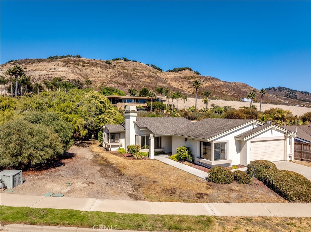 Experience the charm of the Central Coast in this nicely maintained residence located in the gated community of Sunset Palisades, Shell Beach. Prime location and just minutes from prestine beaches and local dining or boutique shopping. Designed for indoor-outdoor living, this home features: Open concept floor plan with seamless flow, versatile bonus room which is perfect for office, guest space or studio. Large corner lot next to open green belt area for your privacy and open area feeling. Whether you are looking for a peaceful second home or a full-time beachside retreat, this property offers the perfect blend of comfort, convenience, and coastal beauty.