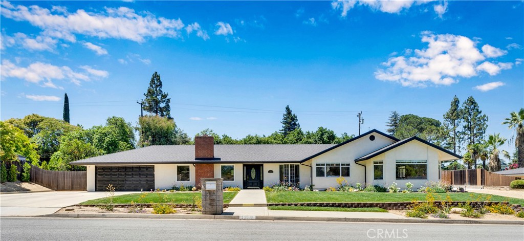 Mid-Century Ranch Retreat with Modern Upgrades & Resort-Style Backyard. Welcome to this beautifully updated home that blends timeless charm with contemporary comfort. Boasting numerous upgrades throughout, this spacious residence features an open, functional layout with newer dual-pane windows, stylish new light fixtures, and a thoughtfully converted fourth bedroom that now serves as a luxurious primary suite. The expanded primary retreat includes a spa-inspired bathroom with a relaxing Jacuzzi tub, a separate walk-in shower framed with elegant glass blocks, and ample space to unwind. This room also has a large picture window and high ceilings with exposed wood beams. The home also features a surround sound system, and all appliances are included—making your move-in smooth and easy. The hall bathroom also houses the washer and dryer hook-ups and has a separate door to the exterior. Enjoy year-round comfort with a newer water heater, HVAC, and a solar power system that is three years into a 20-year purchase plan—an eco-conscious and cost-efficient bonus. There’s a Murphy bed in the middle bedroom convenient for over night guests. Step outside to your private entertainer’s dream backyard, complete with: A built-in BBQ and sink with big screen tv, sparkling swimming pool, fire pit for cozy evenings, low-maintenance turf, perfect for kids and pets, and numerous fruit trees and your very own putting green!! There’s RV parking on the side and generator/casita hookups. The roof was replaced in 2021. Fresh front yard landscaping and a generously sized garage offers ample storage or workshop space. Conveniently located near the 10 Freeway and just minutes from Redlands Country Club, this home offers both lifestyle and location. Don’t miss the opportunity to own this upgraded gem with features rarely found at this price point. Schedule your tour today! <<Click on virtual tour>>
