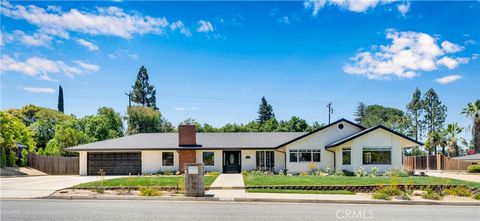 Photo of 406 Eucalyptus Drive, Redlands, CA 92373 (MLS # CV25156638)