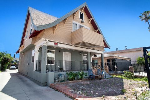 Photo of 708 W 40th Pl, Los Angeles, CA 90037 (MLS # SR26089504)