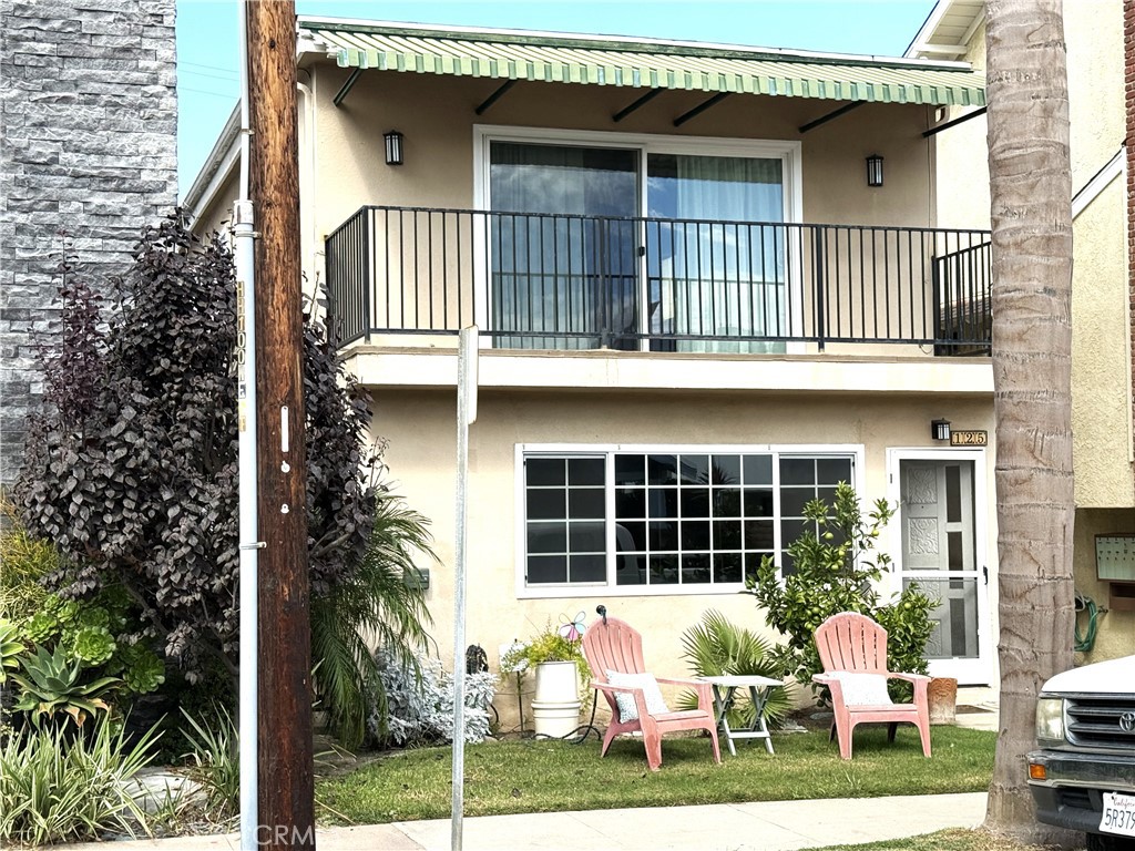 Just one block from the beach, this spacious 2-bedroom, 1.25-bath unit offers the best of coastal living. Enjoy flowing laminate floors throughout and a thoughtful layout with a long hallway that provides privacy between the bedrooms and living spaces. The generously sized U-shaped kitchen features ample cabinetry, abundant countertop space, an electric range, and a dishwasher—perfect for cooking and entertaining.
Relax in the expansive living room or step out onto your large private balcony to enjoy fresh ocean breezes. Additional conveniences include one covered carport space and on-site community laundry on the first floor. Don’t miss this opportunity to live steps from the shore in a comfortable, inviting home!