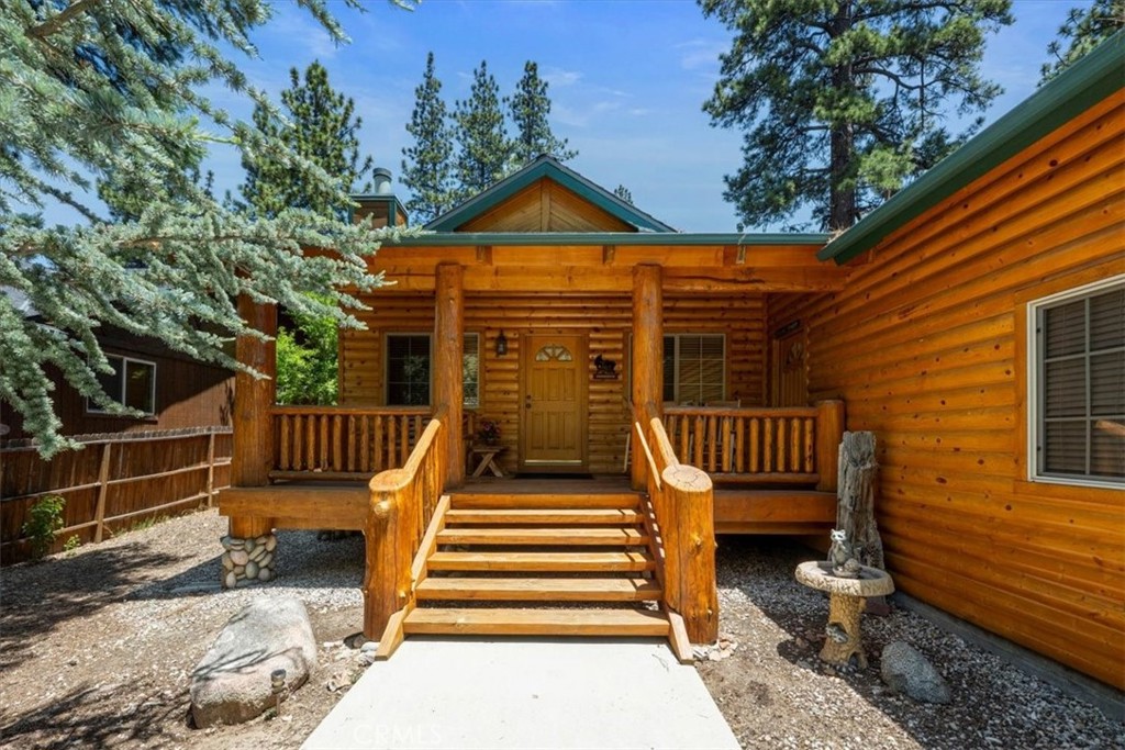Beautifully appointed 3 bedroom, 2 bathroom single family home in the desirable Fox Farm area of Big Bear Lake. The tongue and groove vaulted ceiling in the living room, kitchen, and dining area with log accents give you the real mountain feel. Each of the three oversized bedrooms have plenty of room for large beds or multiple bed options. The master bath has a shower and separate jetted jacuzzi soaking tub. There are two decks in the back - one off the kitchen and one off the master. The inviting front porch is perfect for morning coffee or drinks watching the wildlife in the cool summer evenings. The oversized 2 car garage has room for two cars and your toys. The original owners have had this home almost 25 years and it is ready for you to enjoy. Come spend beautiful summers and cozy winters in this quiet Fox Farm home.
