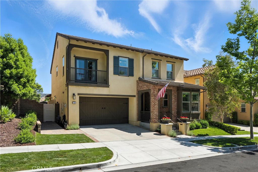 Rancho Mission Viejo! 12 Rastro St isn’t just a home—it’s a lifestyle in one of Ranch Misson Viejo’s most beloved neighborhoods offering a rare blend of luxury, style, and community spirit—set on the iconic “Candy Cane Lane,” a neighborhood known for its festive Halloween, Christmas, and Holiday displays.
This pristine move-in ready and newly remodeled TRI Pointe home boasts 4 bedrooms, 3 bathrooms, a spacious upstairs loft/bonus area, family room, garage, and open design kitchen.
Inside, you'll find brand-new wide plank flooring, plantation shutters, and a bright, open-concept layout that seamlessly connects living, dining, and entertaining spaces. The chef’s kitchen is a standout, featuring a large island with seating, granite countertops, stainless steel appliances, walk-in pantry, and a sunny dining area—flowing naturally into the great room with cozy fireplace and south-facing views of the surrounding hills.
Upstairs, a generous loft offers a second living space which can be used for a playroom, office area, or just relaxation, while the oversized primary suite is a serene escape with dual vanities, a soaking tub, E-stone countertops, hillside views, and a custom walk-in closet. Two additional upstairs bedrooms (one with French-door balcony) dual-sink bathroom, and an upstairs laundry room complete the level.
Step outside to your private entertainer’s backyard, highlighted by a built-in Linx BBQ with new beverage fridge, fire pit, jacuzzi spa (optional), outdoor TV, and covered outdoor dining area—perfect for relaxing evenings or hosting friends.
Energy-efficient features include seller-owned solar panels, tankless water heater, air conditioning with upstairs and downstairs controls, low maintenance back-yard turf and drip watering system. The 2-car garage comes with hanging storage and custom built-in cabinets.
Enjoy walking distance to resort-style Sendero Pool and Clubhouse, pickleball courts, parks, hiking trails as well as bike trail/e-bike access to all of RMV, downtown San Juan Capistrano/River Street, breweries, and local beaches. Sendero is connected to the RMV golf cart/NEV community trail system. Easy access to top-rated schools, scenic beaches, and a 10-minute drive to Dana Point Harbor.