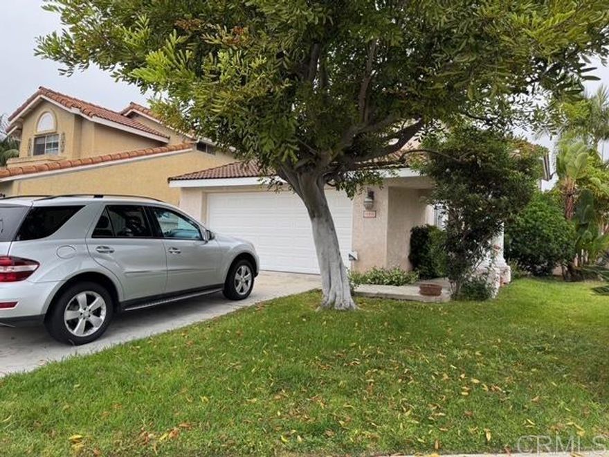 AVAILABLE FOR SHOWINGS BY APPOINTMENT ONLY OR AGENT  COMPLETE REHAB!  All new Luxury Vinyl Planks, new 4 1/2" baseboards, all newly painted ceiling to baseboards, new appliances, all new sink fixtures, lighting fixtures, all new window treatments ordered, solar shades, blinds, new toilets, and more. Kitchen counters, sink, and faucet remodeled 5-2024.   Two-story home located on a private culdesac in the Villa Trinidad community. This 4-bedroom, 3-bathroom residence boasts NEW Luxury Vinyl Plank flooring, soaring 15-foot ceilings. The main floor offers a bedroom and a full bathroom. Both a living room and a large family room area that flows into an eat-in kitchen nook and the recently remodeled kitchen - new granite countertops, sink, and faucet (5-2024). Upstairs, the primary suite has a fireplace, a double sink vanity bathroom with full shower and separate soaking tub. Natural light from a large skylight. Large walk-in closet. Two additional upstairs bedrooms connected by a Jack-and-Jill bathroom with double sink vanity, separate toilet room with bathtub-shower combo.   Villa Trinidad Community offers open spaces, a beautiful community HOA maintained park, perfect for relaxing picnics or community gatherings. Enjoy a low-maintenance yard with owner provided monthly gardener. Conveniently located near shopping, Trader Joes, dining, and more. Six miles/10 minutes to the beach! Quick access to I- 5 and 78 freeways for stress-free commuting.