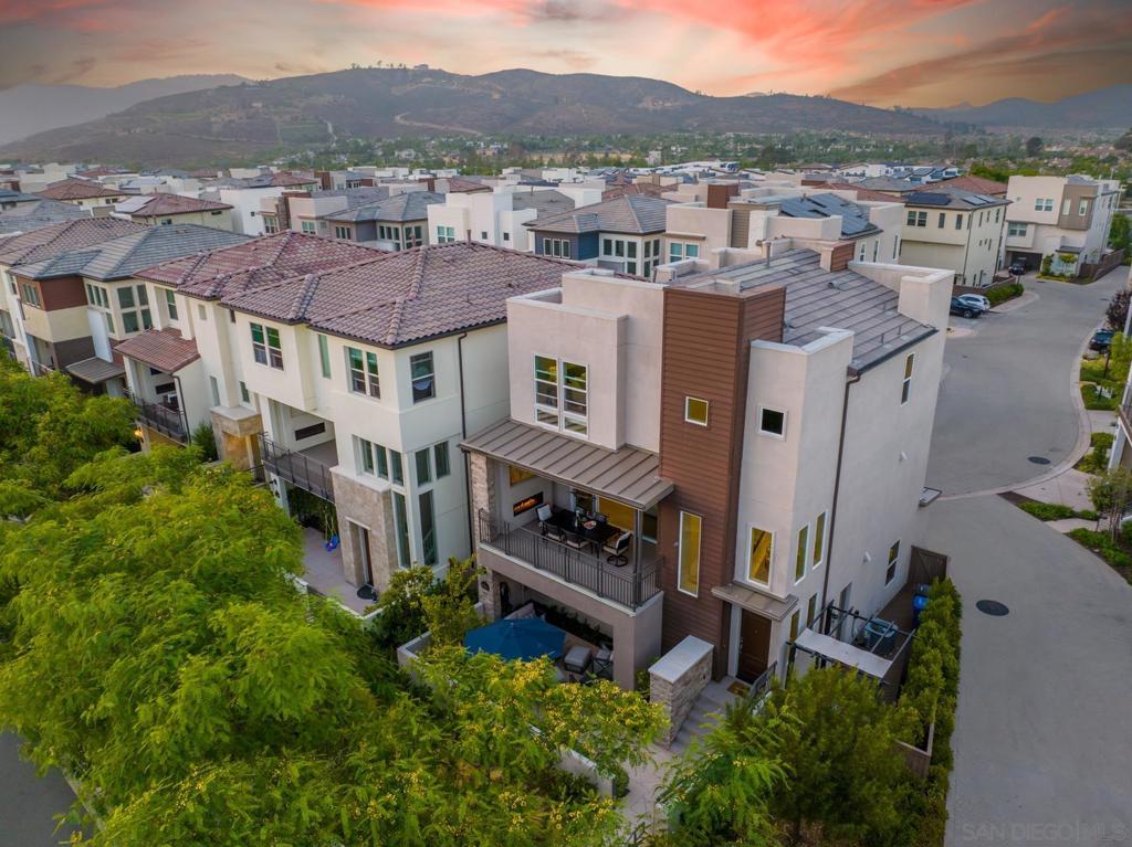 Enjoy gorgeous canyon views & ocean breezes in this contemporary 3bd/3.5ba condo located in the sought after Del Sur community. Premium corner lot location allows privacy off of 3 separate entertainment areas - lower patio level, 2nd story balcony & side patio. Wide plank vinyl flooring throughout main living areas and stairs. Large picture windows & balconies provide abundant natural light. Bottom fl has bd/ba, 2nd fl is main living area & 3rd fl has primary suite, secondary bdrm & laundry. Walk one block to top rated Poway schools. Other extras include a side sitting area that has been pre-wired for a jacuzzi or can be kept as a private sitting area, whole house water softener and tankless water heater. As part of the Del Sur community, tenant will have access to 9 parks, 8 solar heated pools, 25 miles of walking trails and wonderful restaurants, shopping (Target), work out facilities (Orangetheory), medical and dental offices, hair salons, the list goes on!!