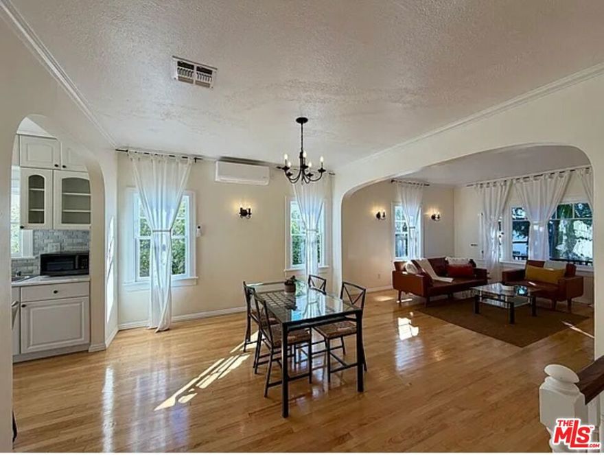 Charming 1920s 2Bed/1Bath upstairs apartment Super bright North of Wilshire & located in a beautifully restored fourplex Faces West with lots of light all dayEntire private, gated grassy front yard as well as back yard Split system A/C (located in dining room)Faux fireplace in living room Washer/ dryer in unit (located in one of the hallway closets)Hardwood floors throughout Brand new Calacatta marble kitchen countertops--just redone Stainless steel appliances Fairy-tale like casement windows Street parking (permit required from City) short  distance to all the shops, cafes, & restaurants in Santa Monica Water/sewer/trash included. Tenant responsible for gas & electric. Pet friendly. 1 yr lease.