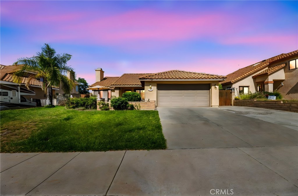 Welcome to 35281 Frederick Street in Wildomar, a charming single-story home offering 4 bedrooms and 2 bathrooms with potential for RV Parking! This residence shows true pride of ownership with a bright, inviting layout and well-maintained interiors that are move-in ready. The spacious floor plan features vaulted ceilings and abundant natural light flowing through the living and family rooms, anchored by a cozy fireplace perfect for relaxing evenings. The kitchen offers ample cabinet storage, generous counter space, and an open connection to the dining area ideal for family meals and entertaining. The primary suite includes a private bathroom, while three additional bedrooms provide flexible space for family, guests, or a home office. Beautiful updates and neutral finishes throughout ensure a fresh, welcoming atmosphere. Outside, enjoy a generous 7,405 sq ft lot with manicured landscaping and great curb appeal. You’ll be treated with a beautiful custom Alumawood patio cover that spans the length of the property.The private backyard features a patio area perfect for BBQs and outdoor gatherings, plus plenty of room for kids, pets, or gardening. The attached 2-car garage offers secure parking and extra storage, with additional driveway parking for guests. The home includes a durable tile roof and central heating and air conditioning for year-round comfort. There are no HOA fees or Mello-Roos taxes, providing freedom and lower monthly expenses. Conveniently located near the I-15 freeway, shopping centers, restaurants, and highly-rated schools, this home offers easy access to daily amenities and excellent educational opportunities. Nearby parks and recreational areas complete the picture for comfortable Southern California living. This lovely Wildomar home combines comfort, convenience, and pride of ownership. Don’t miss your chance to make it yours!