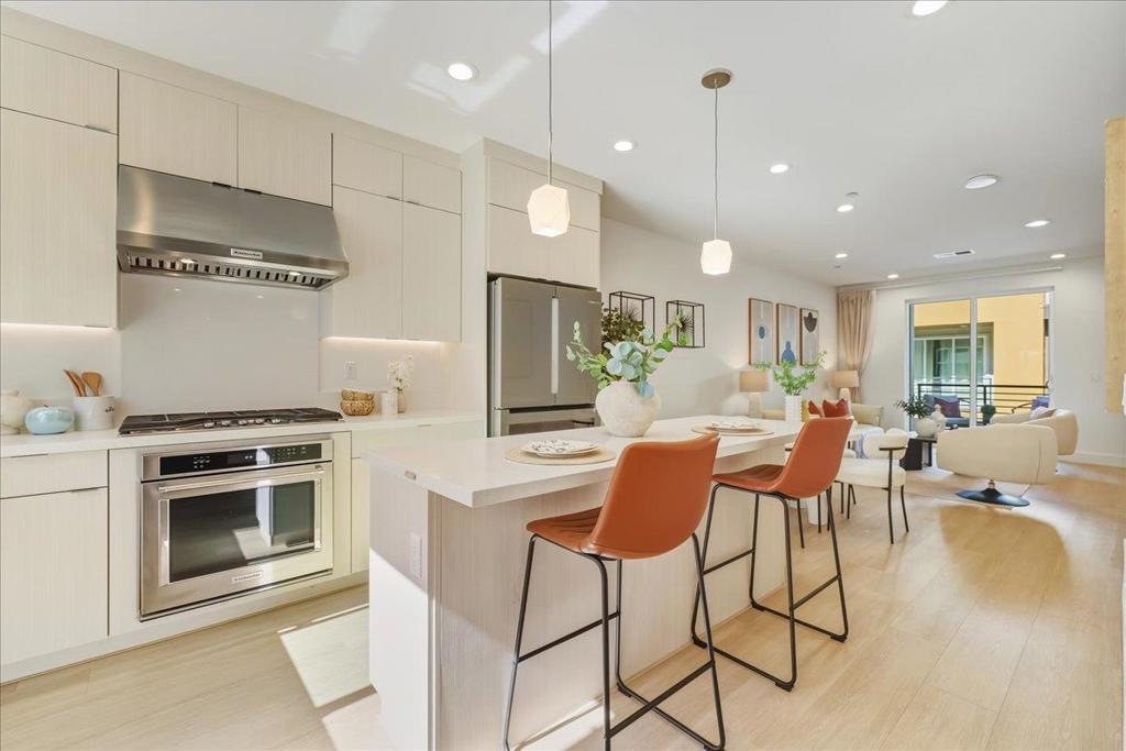 Discover modern comfort and exceptional quality at 3388 Router Common, located in one of Fremonts most desirable communities. This beautifully maintained home showcases top-tier construction and thoughtful upgrades throughout. Enjoy peace of mind with a durable metal roof and solar panels installed by the HOA  offering monthly electricity credits and exceptionally low utility costs. Inside, the upgraded kitchen features elegant cabinetry, additional built-in storage, and stylish flooring that flows seamlessly across both levels.  The spacious layout includes high ceilings throughout the third floor, with the primary bedroom featuring soaring ceilings and abundant natural light. Additional highlights include a side-by-side garage with a tankless water heater and water softener system for added comfort and convenience.  Ideally situated in a quiet, interior location within the community, this home also benefits from an excellent school district  combining tranquility, energy efficiency, and long-term value in one perfect package.