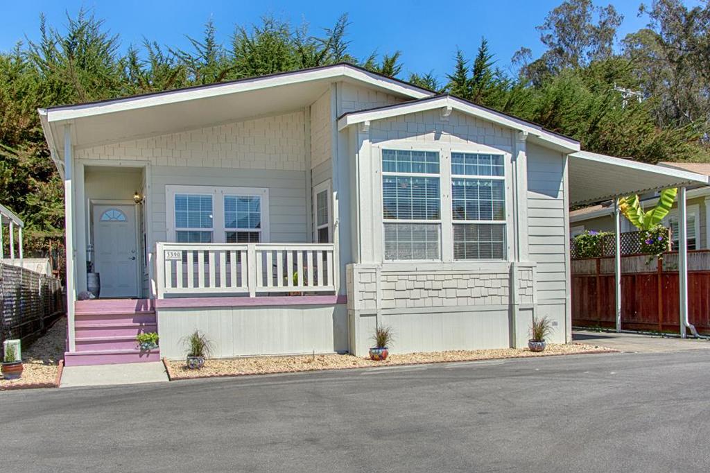 Located in desirable Cliffwood Estates, this well-maintained 1,680 sq. ft. Silvercrest home (built in 2006) blends comfort, space, and thoughtful upgrades. Energy-efficient features include 2x6 walls, upgraded insulation, dual-pane windows, and ceiling fans throughout. Inside, high ceilings, crown molding, and gleaming hardwood floors create a bright, inviting feel. The spacious kitchen offers abundant maple cabinetry, a large island, and pantry, with a convenient laundry room nearby. The cozy living room with gas fireplace flows into the dining area perfect for entertaining. The primary suite boasts two walk-in closets and a large bath with double sinks, soaking tub, and walk-in shower. The guest bedroom also features a walk-in closet, and the office/den can flex as a third bedroom. Extras include a light tunnel in the guest bath, water softener, water filtration system, and a wheelchair lift in the carport. Nestled at the back of the park and just steps from the park's secluded gazebo provide the homeowner with privacy and serenity. This home is minutes from Cabrillo College, New Brighton Beach, and the quaint towns of Soquel and Capitola. Cliffwood Estates is a resident-owned 55+ co-op with low dues and a warm, welcoming vibe. Schedule your appointment now.