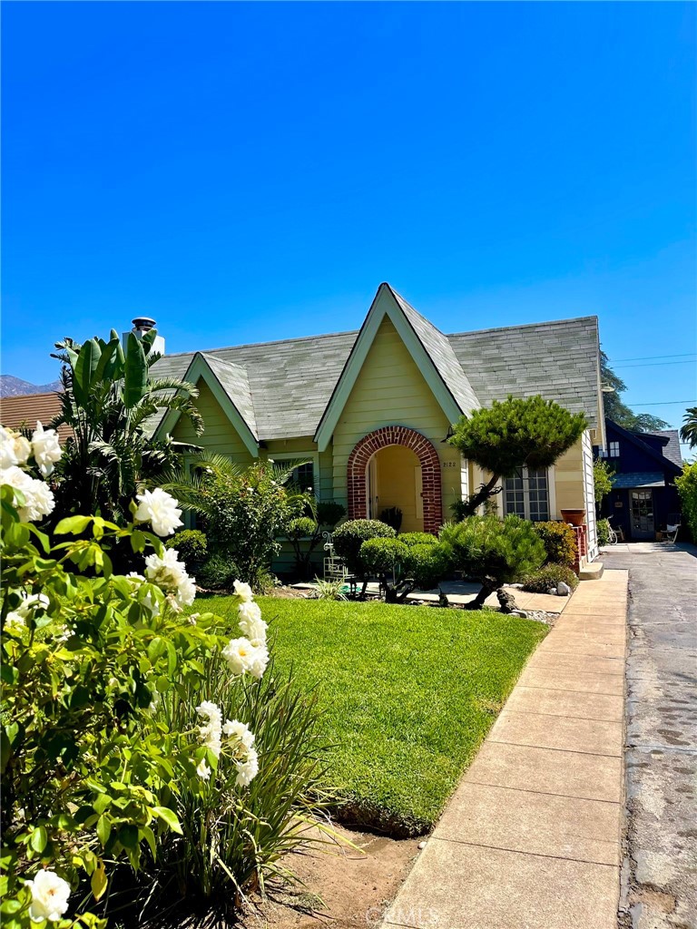 Welcome to a home with charm and character. This quintessential 1920s English cottage feels like it's straight out of a storybook. There are two homes on the lot, the front house is available for rent. Located on one of Altadena's most beautiful tree-lined streets, you'll have the best of the San Gabriel Valley right at your doorstep with mountain views. Spend your weekends exploring the nearby Rose Bowl, JPL, or the area's rich selection of dining, shopping, and museums. Easy access to freeways and public transport means you're just minutes from neighboring Pasadena and La Cañada Flintridge, along with the scenic hiking and biking trails of this foothills community. Inside, the single-story front house offers over 1,300 square feet of comfortable living space. The spacious layout includes three good sized bedrooms, two bathrooms nicely tiled, an expansive living room with a cozy fireplace and a formal dining room. There are hardwood floors throughout. A generous kitchen with plenty of cabinets and a newer gas stove and refrigerator. The home oozes with charm. There is space for a stackable washer and dryer or a self vented unit to hook up. Step outside to a lovely, grassy front yard or relax on the one-of-a-kind backyard patio with a built-in barbecue—a perfect extension of this already delightful home.
