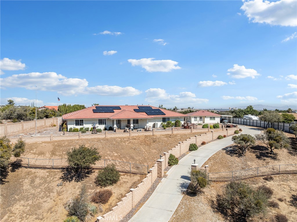 Welcome to this exceptional Citrus Valley property offering two homes on one expansive 2.2-acre lot with endless possibilities. The main residence boasts 5 bedrooms and 3 bathrooms across 3,228 sq. ft. of living space, designed for both comfort and entertaining. A dramatic entrance with a long private driveway sets the stage, leading you to a home filled with upgrades and thoughtful details.
Step into the beautifully remodeled kitchen featuring modern finishes, ample counter space, and recessed can lighting that enhances its warm, inviting feel. The open layout allows natural light to flow through the home, highlighting its spacious interiors and breathtaking views that stretch for miles.
With solar panels for energy efficiency, this estate combines style with sustainability. The additional home on the property adds versatility—perfect for extended family, guests, or potential rental income. Outdoors, the sprawling acreage provides plenty of room to create your dream retreat, whether it’s a garden, pool, or entertaining space.
Experience the rare opportunity to own a private estate with space, functionality, and stunning views all in one. This is the perfect place to call home in Citrus Valley!