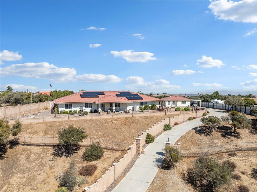 Welcome to this exceptional Citrus Valley property offering two homes on one expansive 2.2-acre lot with endless possibilities. The main residence boasts 5 bedrooms and 3 bathrooms across 3,228 sq. ft. of living space, designed for both comfort and entertaining. A dramatic entrance with a long private driveway sets the stage, leading you to a home filled with upgrades and thoughtful details.



Step into the beautifully remodeled kitchen featuring modern finishes, ample counter space, and recessed can lighting that enhances its warm, inviting feel. The open layout allows natural light to flow through the home, highlighting its spacious interiors and breathtaking views that stretch for miles.



With solar panels for energy efficiency, this estate combines style with sustainability. The additional home on the property adds versatility—perfect for extended family, guests, or potential rental income. Outdoors, the sprawling acreage provides plenty of room to create your dream retreat, whether it’s a garden, pool, or entertaining space.



Experience the rare opportunity to own a private estate with space, functionality, and stunning views all in one. This is the perfect place to call home in Citrus Valley!