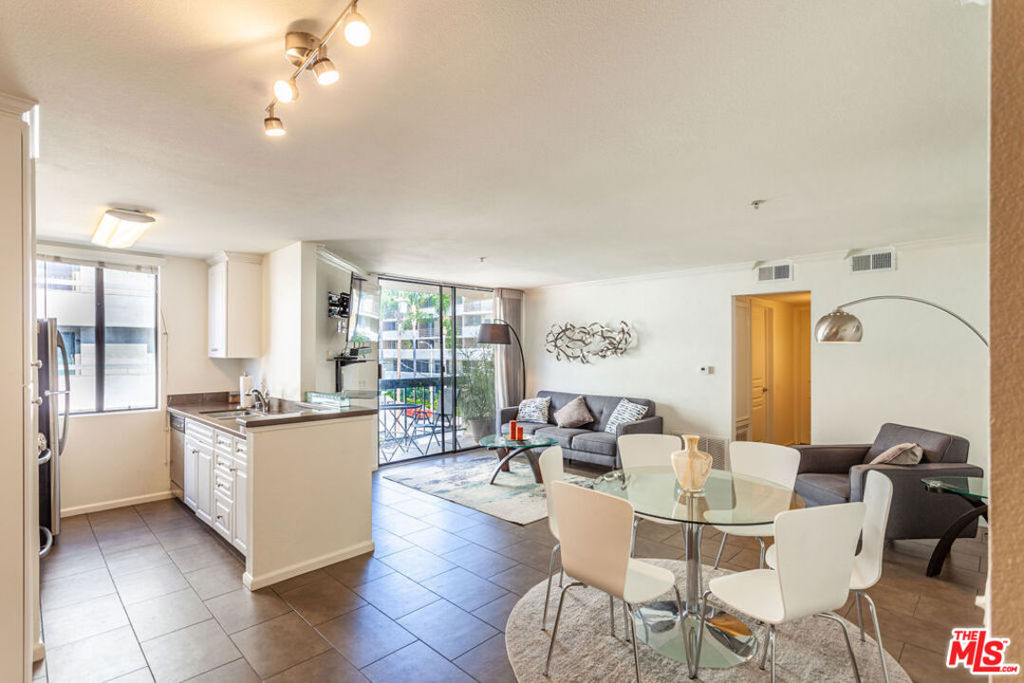 Modern and Fully furnished!! Coming to LA for a project? Flexible lease terms...Whether you need something for 3 months or 1 year, this may be the place for you. This 2 bedroom, 2 bath condo has everything you need for your stay in LA. A Smart TV with sound bar, King Size bed in the primary suite with a walk in closet, all appliances and dishes, in-unit laundry, balcony and more! 2nd Bedroom is a nice size with a queen size bed and has it's own bathroom. The secure building features a sparking pool, hot tub and gym. Have an electric car, no problem, there are EV chargers in the garage. There is one right next to this parking space. 2 car parking and guest parking. Wifi Included!High Walk Score! Close to public transportation, major freeways, Runyon Canyon, Downtown LA, the Valley, The Grove and Beverly Hills. Pets 25lbs and under allowed. Fireplace is decorative. Available Nov 1st.