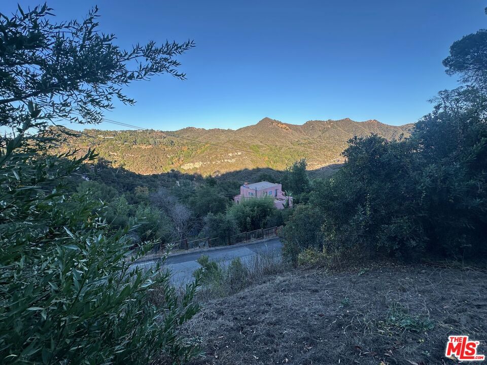 Climate Perfect Fernwood Half-Acre Lot to be Developed with Option of Pre-Fab Home, Manufactured Home or Stick Built. Views to the Topanga Post Office Tract into the California State Park. Build a Gorgeous View Home on this 22,630 sq ft parcel. Purchase Price Includes Survey & Topography Map and Preliminary Plans for Garage and House and Option B for Guest House. Assessors Parcel Number 4447-029-024.