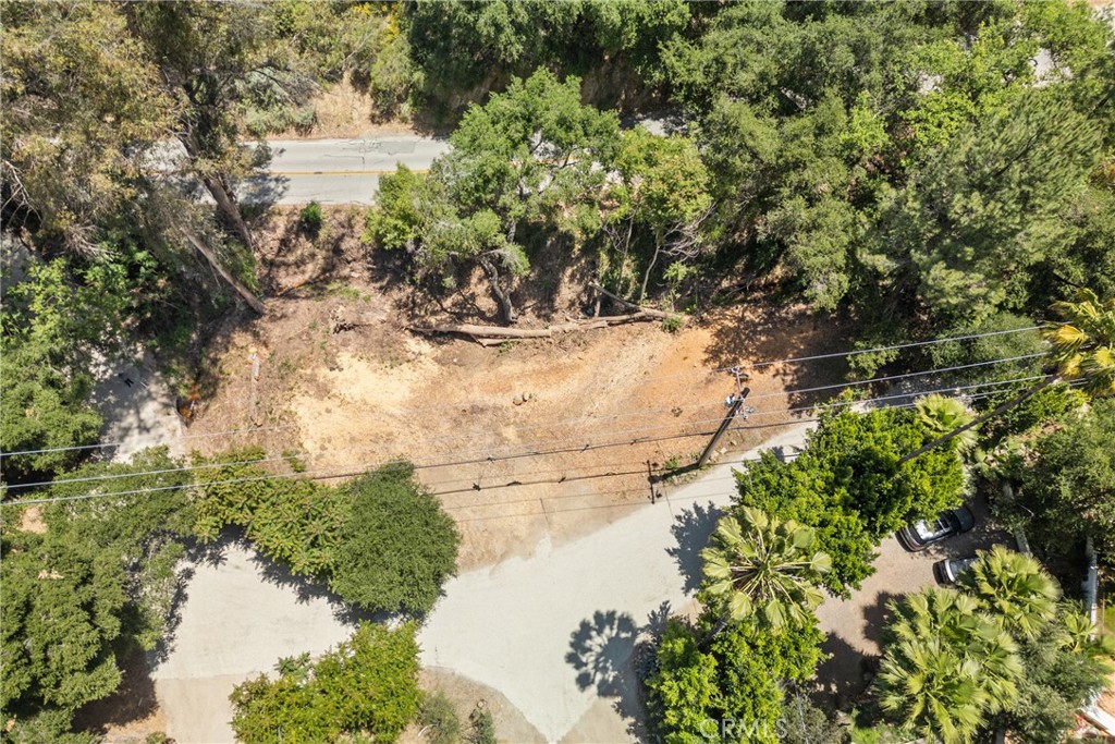Incredible opportunity to own a mostly flat, almost half acre parcel of undeveloped land in the heart of Topanga. Located in a sought-after canyon community and surrounded by existing homes, this lot offers the ideal setting to build your dream home.Ideally located just minutes from Malibu’s beaches and within close proximity to top-rated Calabasas schools, this property combines peaceful canyon living with convenient access to world-class amenities. Surrounded by existing homes, the lot offers both a sense of community and the privacy that Topanga is known for. A topography report is available, offering valuable insight for future development. Don’t miss this rare chance to create a custom residence in one of Southern California’s most scenic and desirable areas.