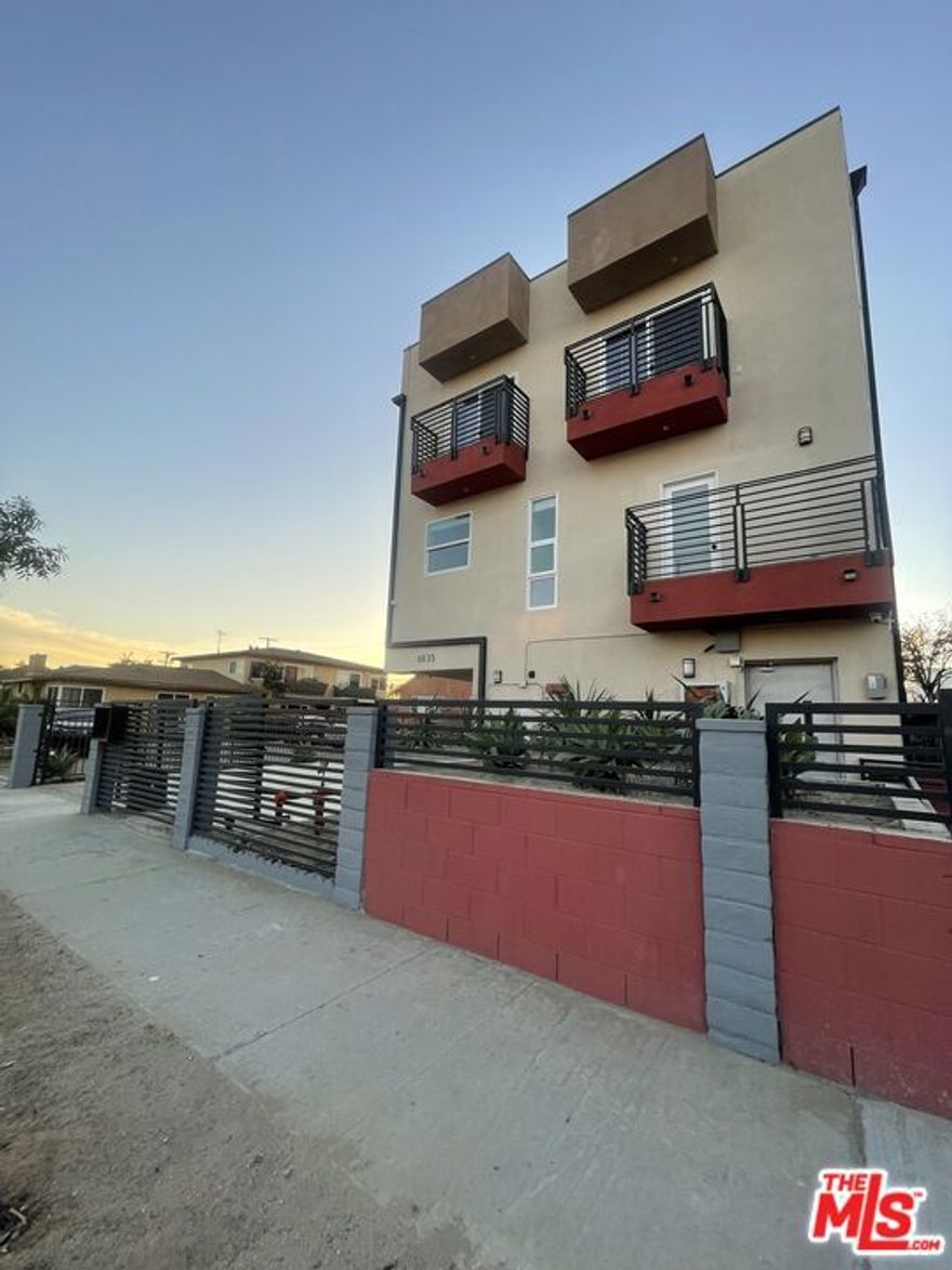 6633 Troost Ave is a massively impressive new construction 4-unit apartment complex less than one mile from NoHo West. This incredible 2020 structure, complete in 2023, is one of the few new constructions fourplexes to house all four units in one building. This property features four huge 3 bedroom, 2.5 bathroom townhome style units with a private 2-car garage on the first floor, a stunning kitchen, powder room, and living room on the second floor, 3 bedrooms and 2 bathrooms with views on the third floor. As you'll see from the photos, the owner has gone to significant expense to offer luxurious and eye-catching features, such as designer mirrors, cabinets, fixtures, tilework, lighting, closets with built-in shelving, countless balconies and expansive windows throughout including central heating and A/C. The unit is equipped with a stackable washer and dryer, refrigerator, dishwasher, stove and microwave. This apartment complex was truly designed to mimic an upscale single family residence! In addition to the outstanding design elements, this property is safe and secured and monitored with cameras throughout the exterior of the building. This unit will go fast!