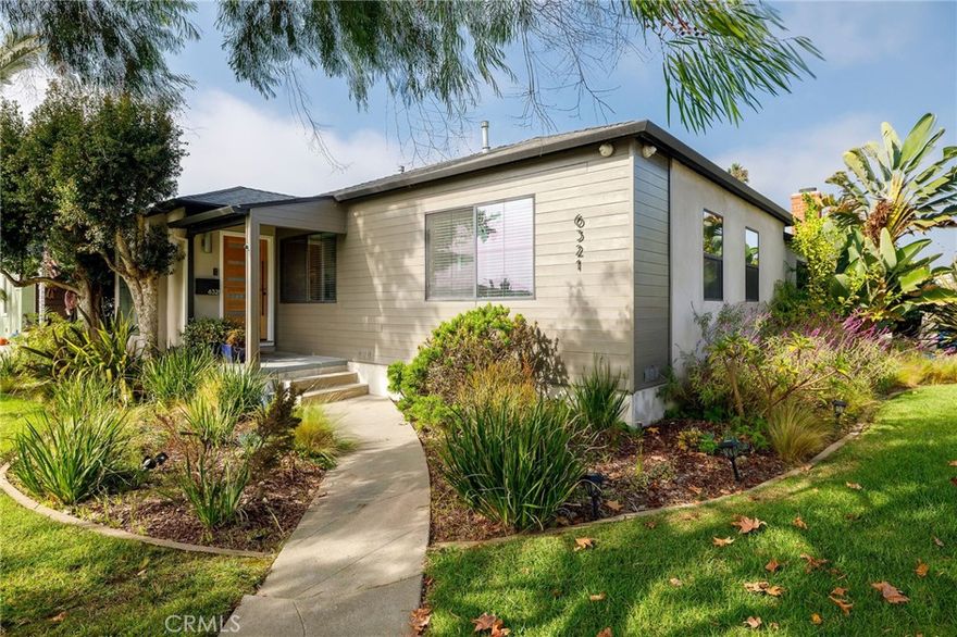 Don't sleep on this Coastal Modern remodeled home in the desirable Kentwood neighborhood, positioned on an oversized South Facing Corner Lot. Upon first glance, you’ll be greeted by California native drought-tolerant landscaping and winding pathway framed by mature shade trees leading to your elevated front porch, complete with a Dutch Door. Inside, wide plank wire-brushed wood flooring flows throughout, a reclaimed wood accent wall, vaulted ceilings, fun wallpaper, and three skylights are just a few of this stunning homes details. The classy nautical themed kitchen features custom finish soft close cabinetry, Quartz countertops with a subway tile backsplash, a wide farmhouse-style sink, floating shelves, designer light fixtures, all stainless appliances, including a professional grade 36” gas range, and there's a large center island, anchoring the space. There are multiple dining options, from casual at the bar/island to just off the kitchen a bit more formal or my favorite, dining al fresco under the covered lanai-style pergola, equipped with heater, ceiling fans, and lighting. The primary suite is private, tucked away and features a cozy fireplace, reclaimed wood accent wall, a custom-built-in Wardrobe Wall, and primary bath with marble and glass tile flooring and a floating vanity. The fourth bedroom, just outside the primary, has been converted into an amazing designer closet. The other two guest bedrooms are just down the hall along with a generously sized full bathroom. There’s also a half bath conveniently off the living room that transitions into the garage. The finished garage extends your living space and is big enough for your fitness/wellness studio, study/office zones, TV/Den area, and it all connects with a slider directly to the yard. The backyard is massive, aside from the huge pergola, there’s a lawn, a large concrete pad with a built-in basketball hoop, and a playset with slide and swings, a literal playground. For the adults, a more intimate setting just off the living room, under the pergola, enjoying a quiet evening or catching the game on the outdoor TV. Great location, great house at an even greater price.