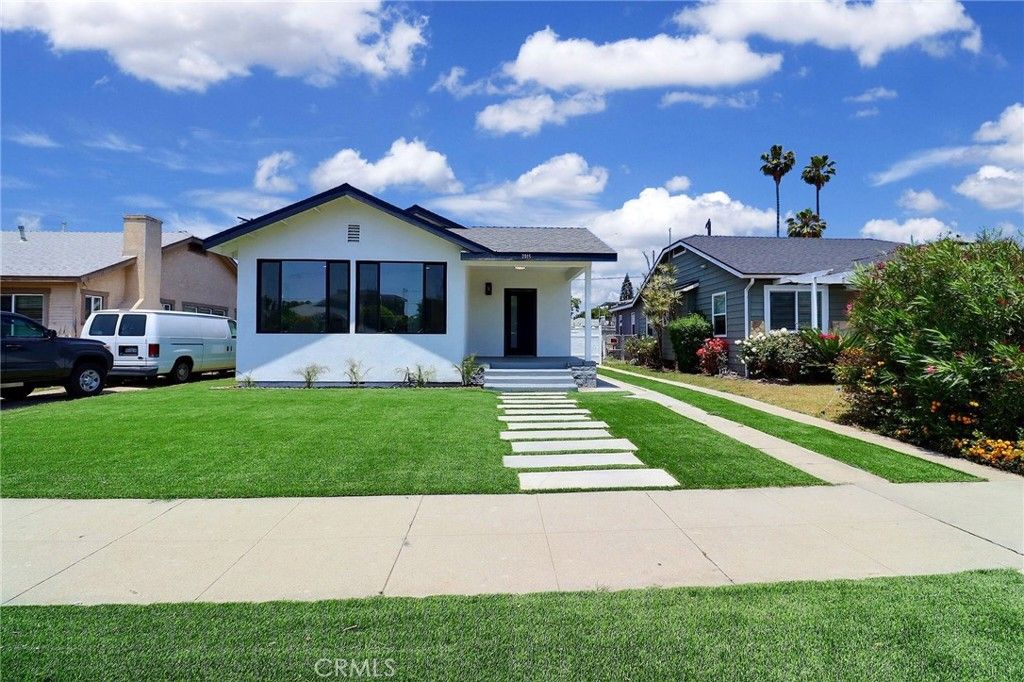 Photo of 2015 W 42nd Place, Los Angeles, CA 90062 (MLS # IV25268370)