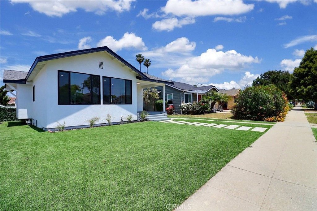 Photo of 2015 W 42nd Place, Los Angeles, CA 90062 (MLS # IV25268370)