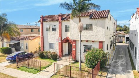 Photo of 1103 W 64th St, Los Angeles, CA 90044 (MLS # SB26057261)